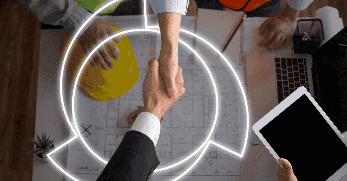 handshake over review blue prints