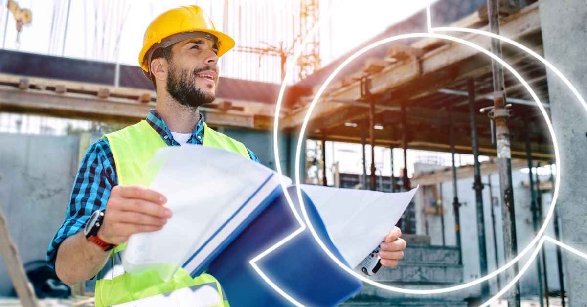 construction worker on site holding folder