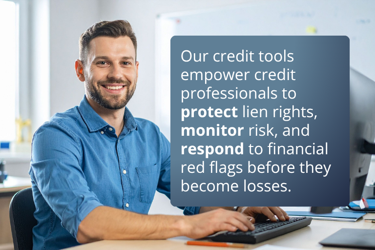 casual professional man at computer facing forward