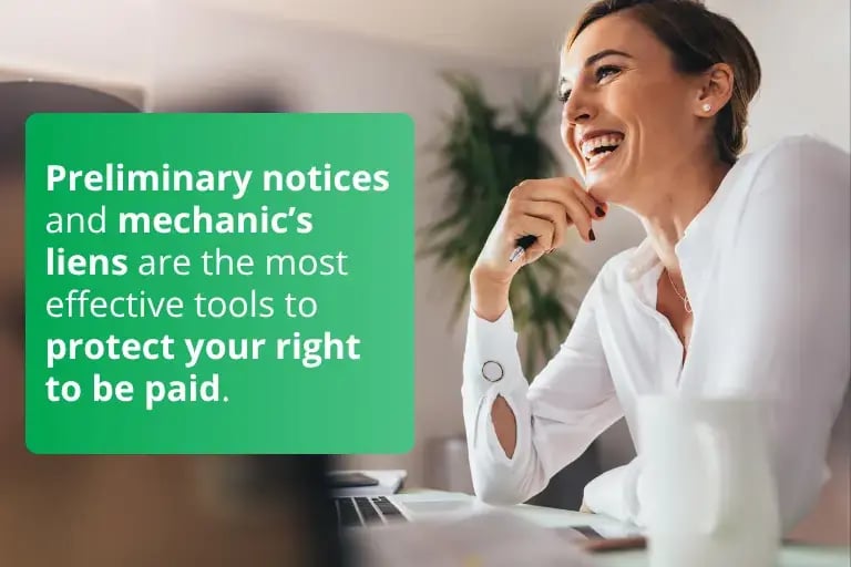 professional woman sitting at desk with laptop