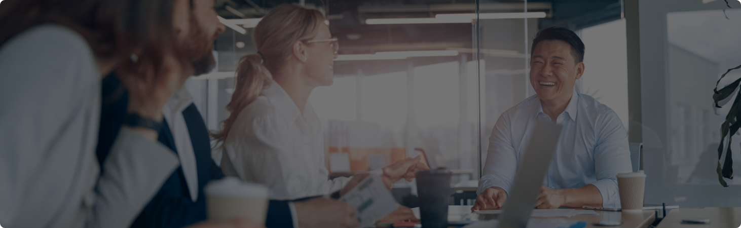 confrence table in modern office with business employees talking and working