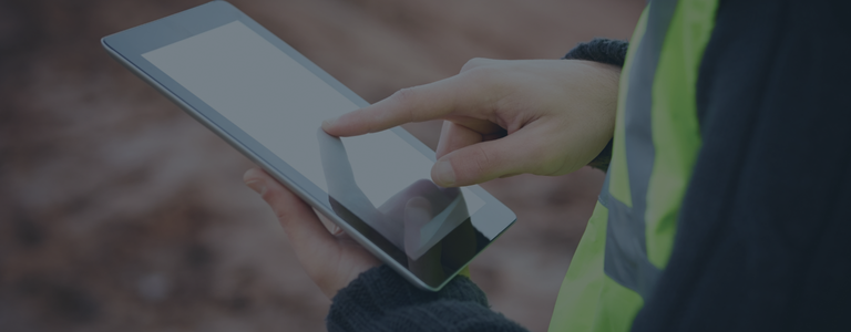 construction worker using tablet